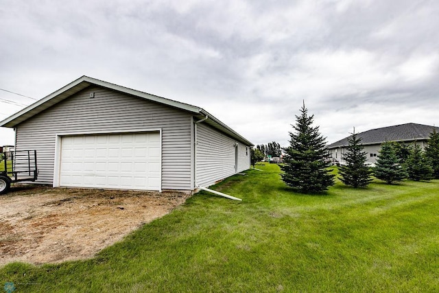 garage with a yard