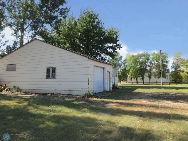 view of home's exterior featuring a yard