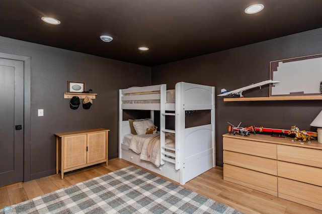 bedroom with light wood-type flooring