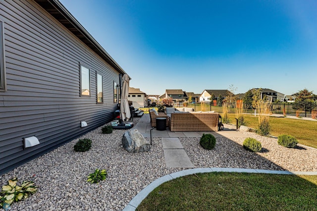 view of yard with a patio area and an outdoor hangout area