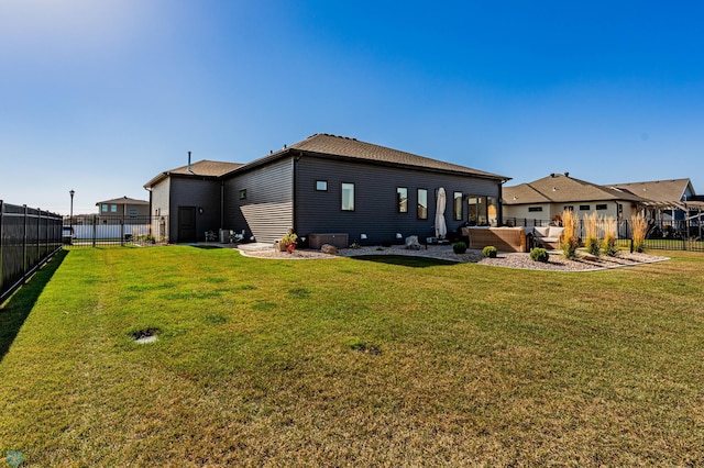 rear view of house featuring a lawn, an outdoor hangout area, and a patio