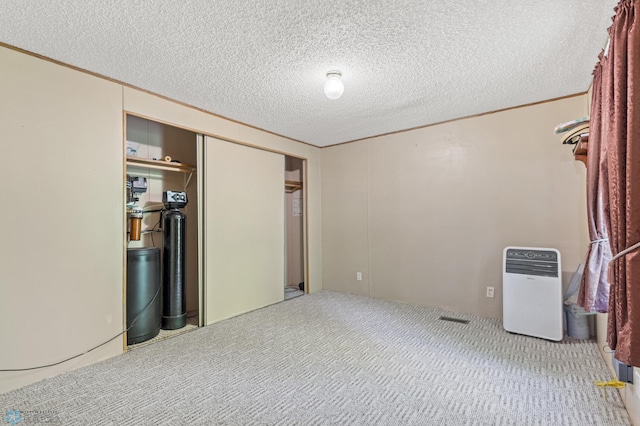 interior space featuring a textured ceiling