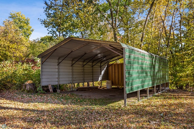 view of vehicle parking with a carport