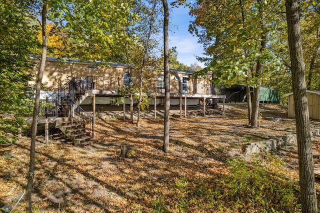 view of yard featuring a deck