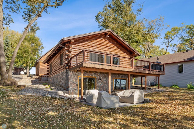 back of property with a patio area