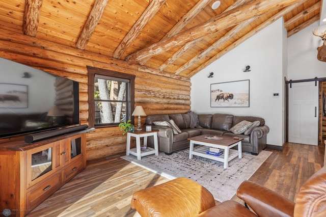 living room featuring wood-type flooring, lofted ceiling with beams, a barn door, and wooden ceiling