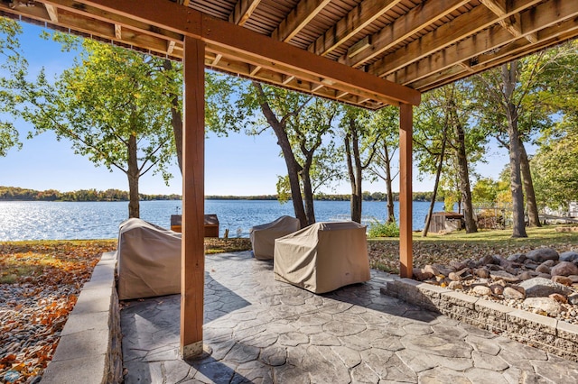 view of patio / terrace featuring a water view