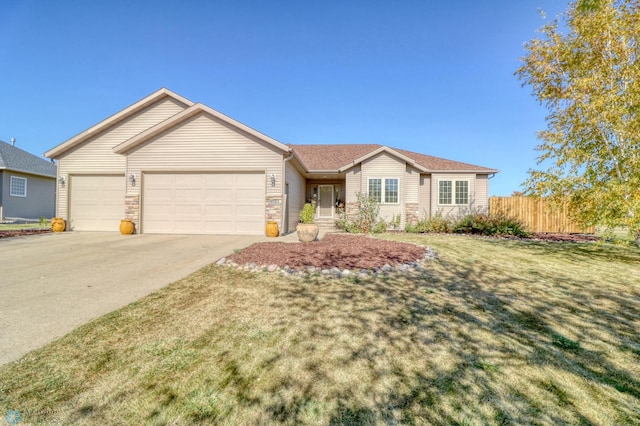 single story home featuring a garage and a front lawn