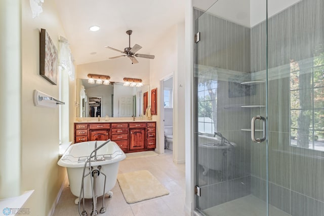 full bathroom with toilet, shower with separate bathtub, and a wealth of natural light