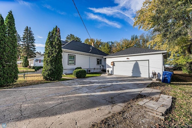 single story home featuring a garage