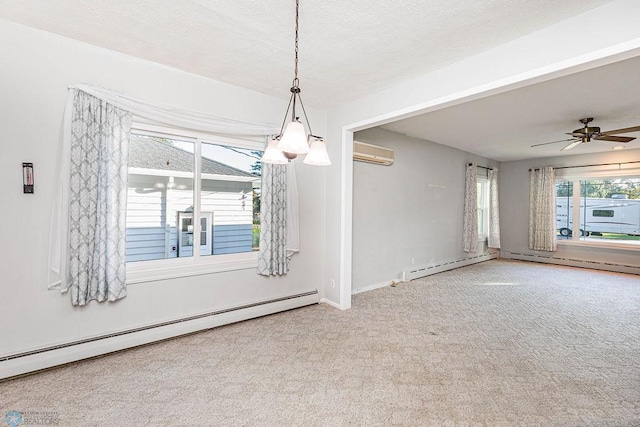 spare room featuring carpet flooring, ceiling fan, a wall mounted air conditioner, and a baseboard radiator