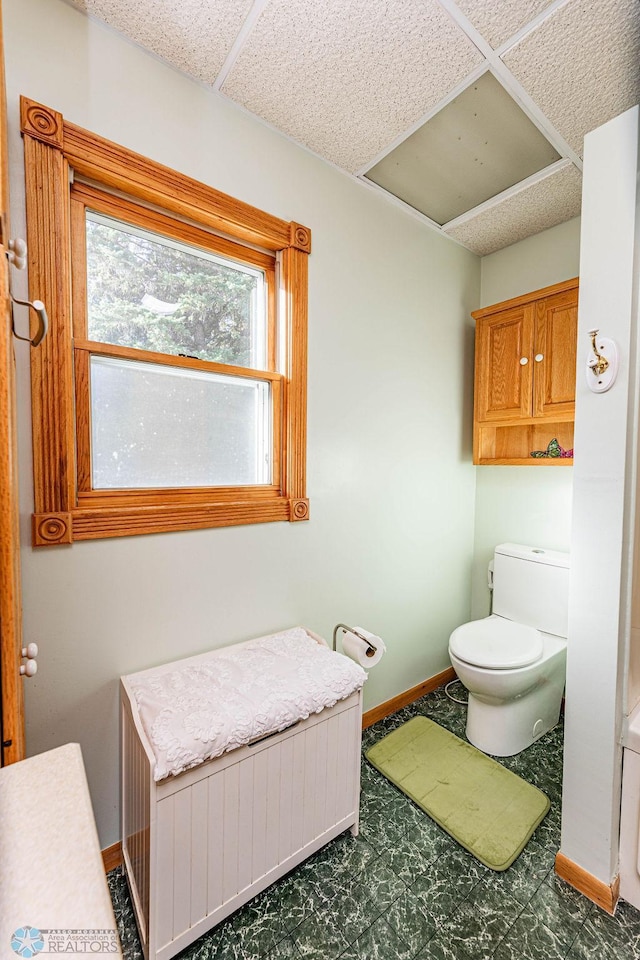 bathroom with radiator and toilet