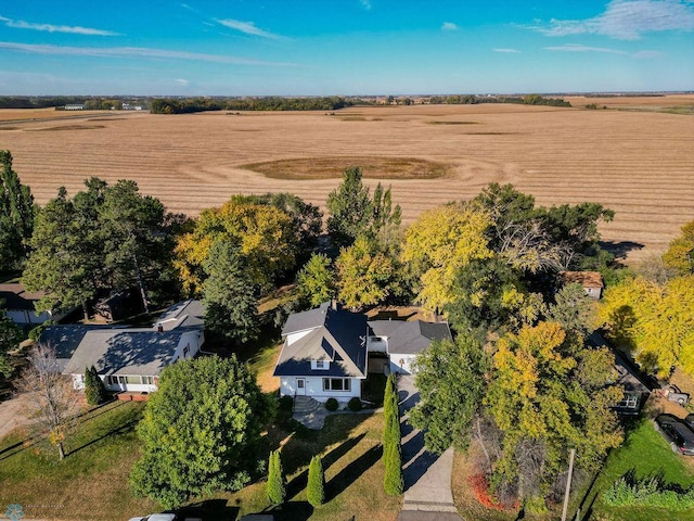 birds eye view of property with a rural view