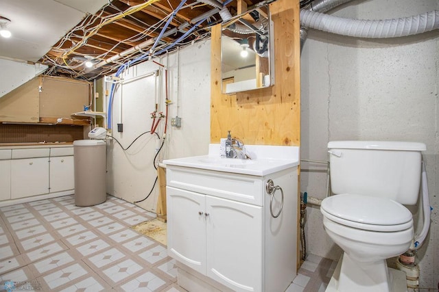 interior space featuring vanity and toilet