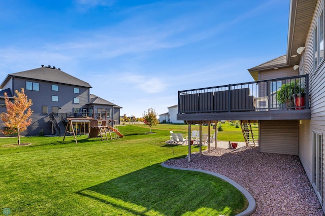 view of yard featuring a wooden deck