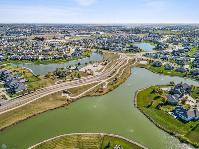 drone / aerial view with a water view