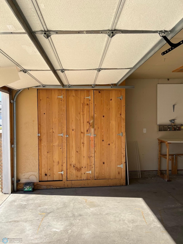 garage with wooden walls