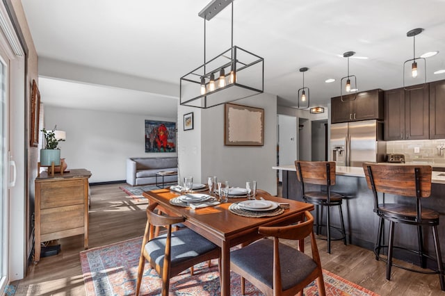 dining room featuring dark wood-type flooring