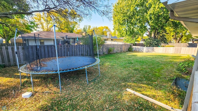 view of yard featuring a trampoline