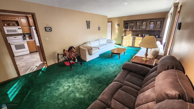 living room with a textured ceiling and indoor bar