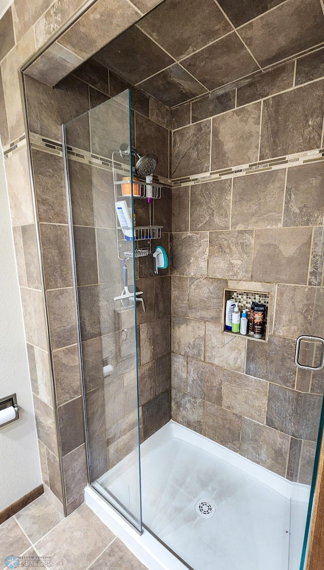 bathroom with an enclosed shower