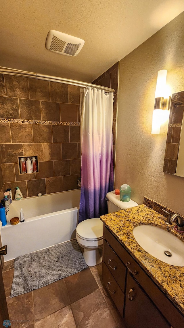 full bathroom with vanity, a textured ceiling, toilet, and shower / bathtub combination with curtain