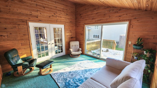 interior space featuring french doors, wood ceiling, and lofted ceiling