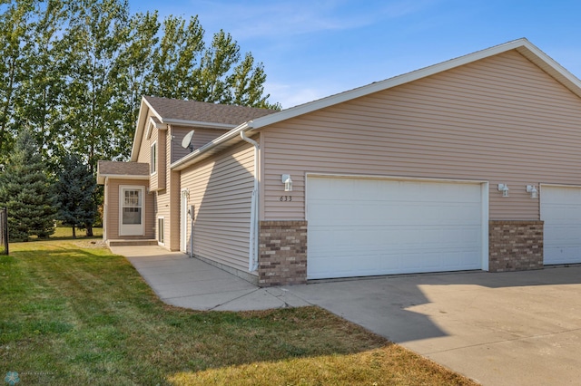 view of home's exterior with a yard