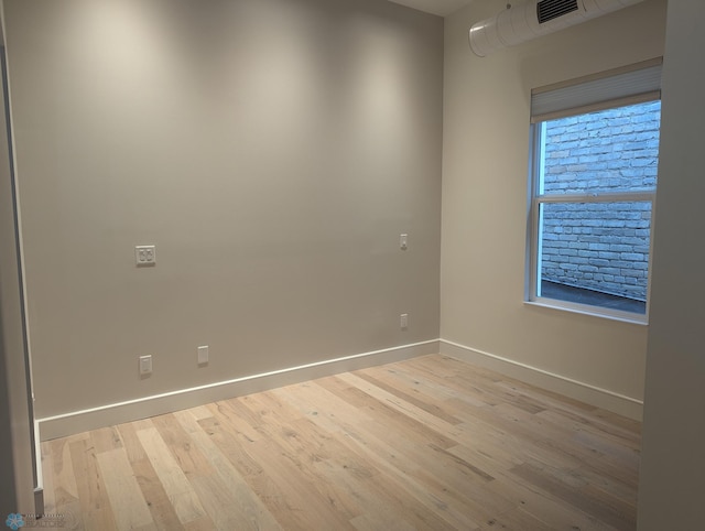 empty room featuring light hardwood / wood-style floors