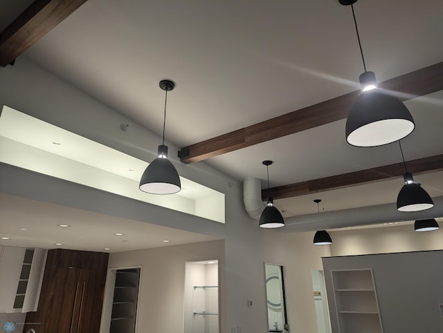 interior details featuring beam ceiling