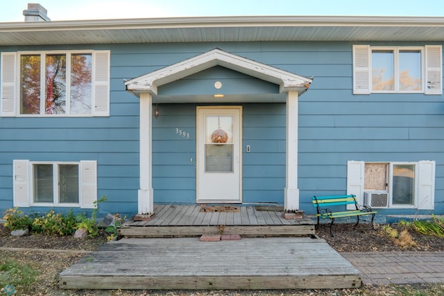 doorway to property featuring a deck