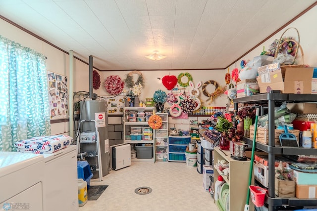 storage featuring electric water heater and washer / clothes dryer