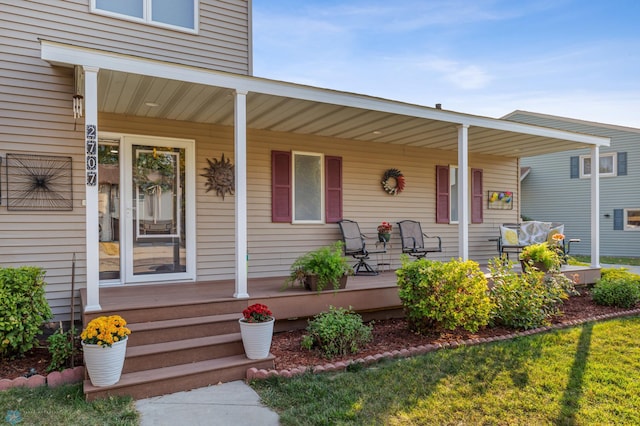 entrance to property with a porch