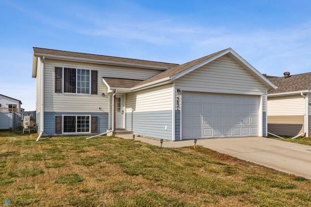 view of front facade with a front lawn and a garage