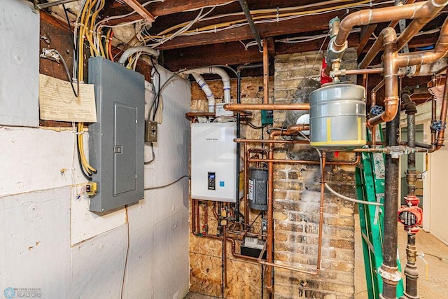 utility room featuring electric panel and water heater