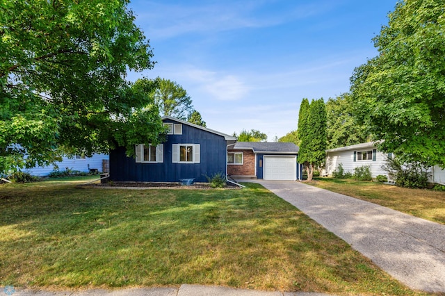 single story home featuring a front yard and a garage