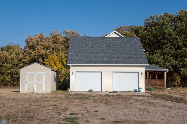 garage with covered porch