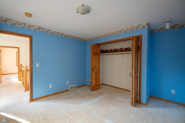 unfurnished bedroom featuring a closet