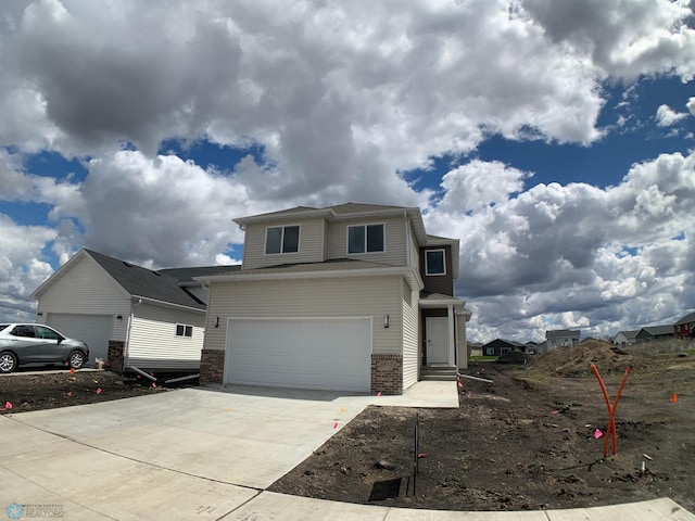 front facade with a garage