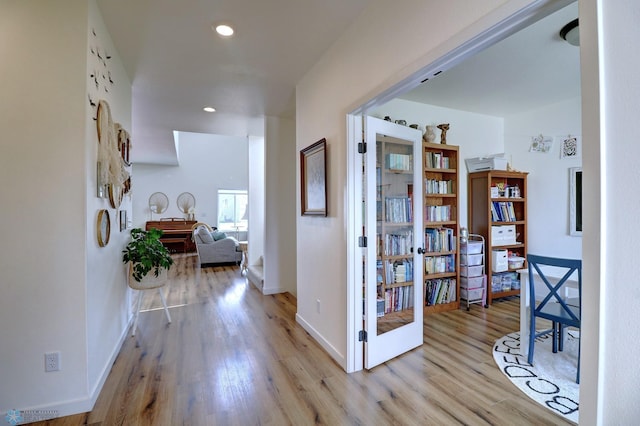 hall featuring light hardwood / wood-style flooring