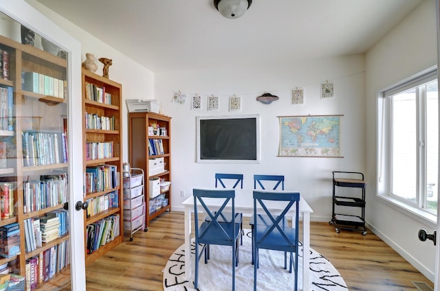 dining area with light wood-type flooring