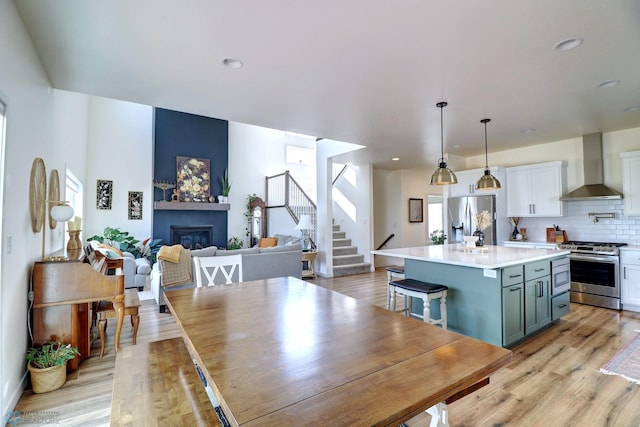 dining room with light hardwood / wood-style flooring