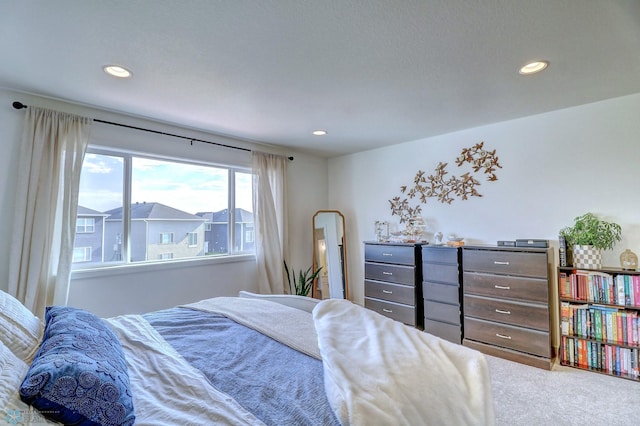 bedroom featuring carpet