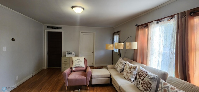 living room featuring ornamental molding and dark hardwood / wood-style floors