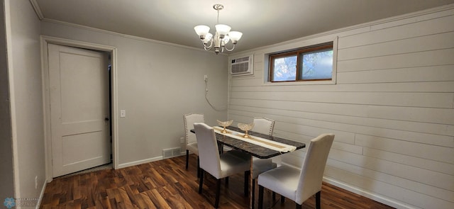 dining room with dark hardwood / wood-style floors, crown molding, a notable chandelier, and a wall mounted air conditioner