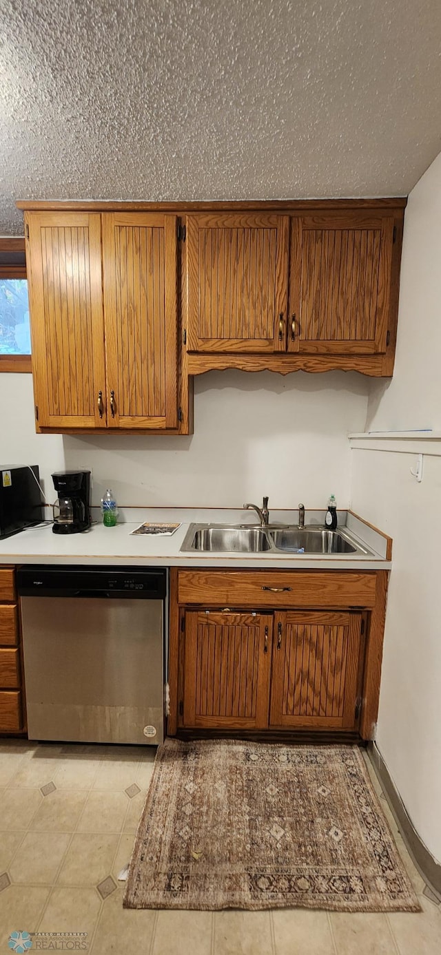 kitchen featuring sink and stainless steel dishwasher