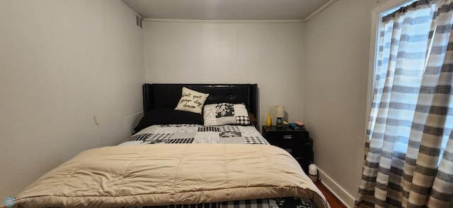 bedroom featuring ornamental molding