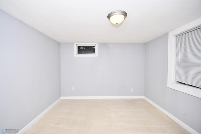 basement with light colored carpet