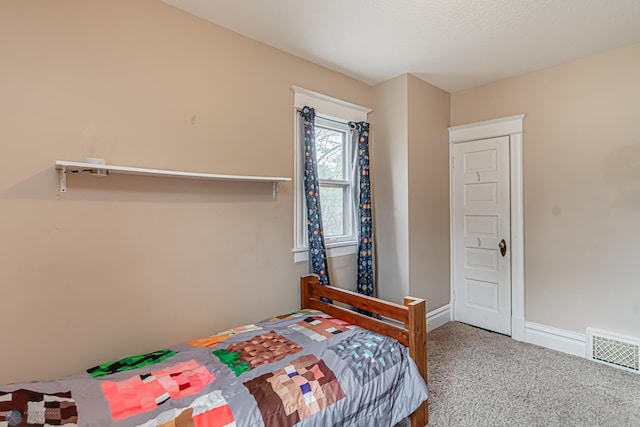 bedroom featuring carpet flooring