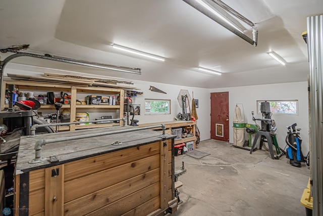 garage with a workshop area